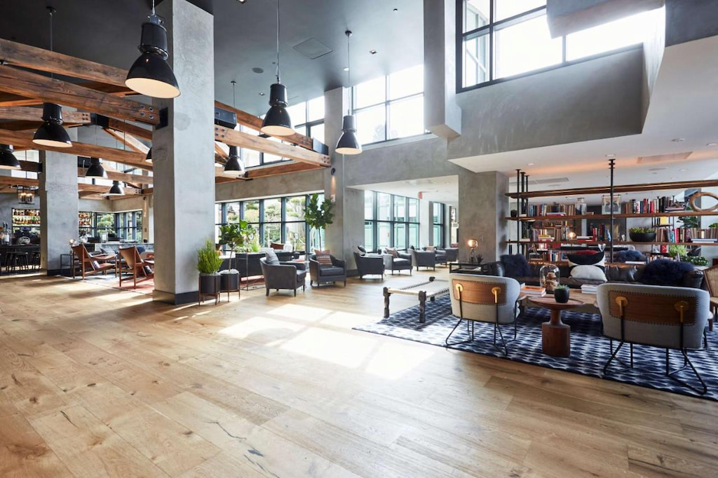 expansive boutique hotel in San Francisco's lobby with large concrete pillars