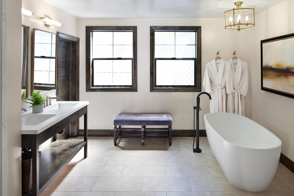 Elegant white tub in one of the bathrooms